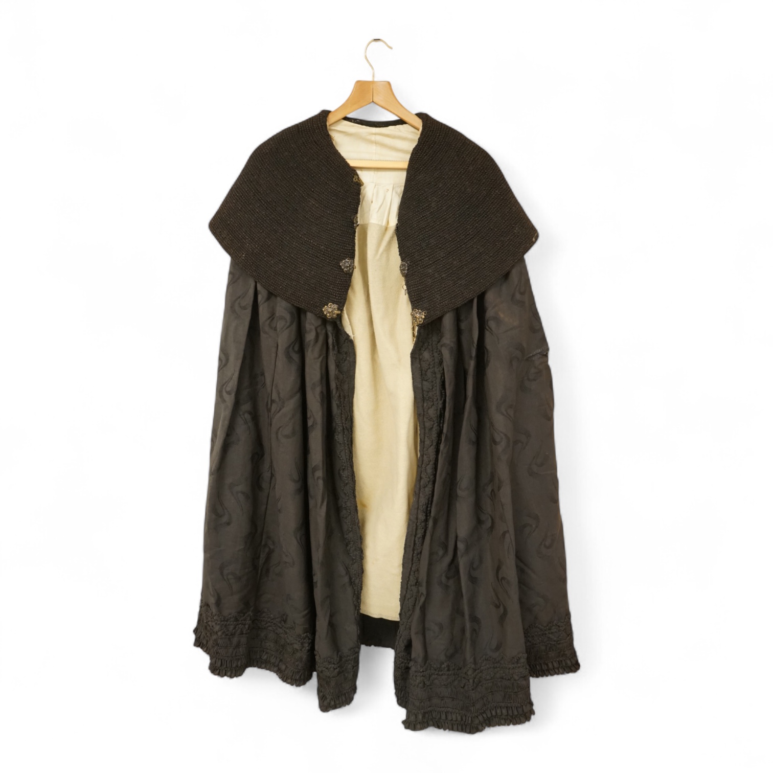 A 19th century German black fabric cape